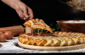 How do you attract customers to your pizza shop?